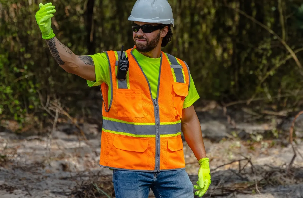 Utility workers in FR hi-vis safety vests
