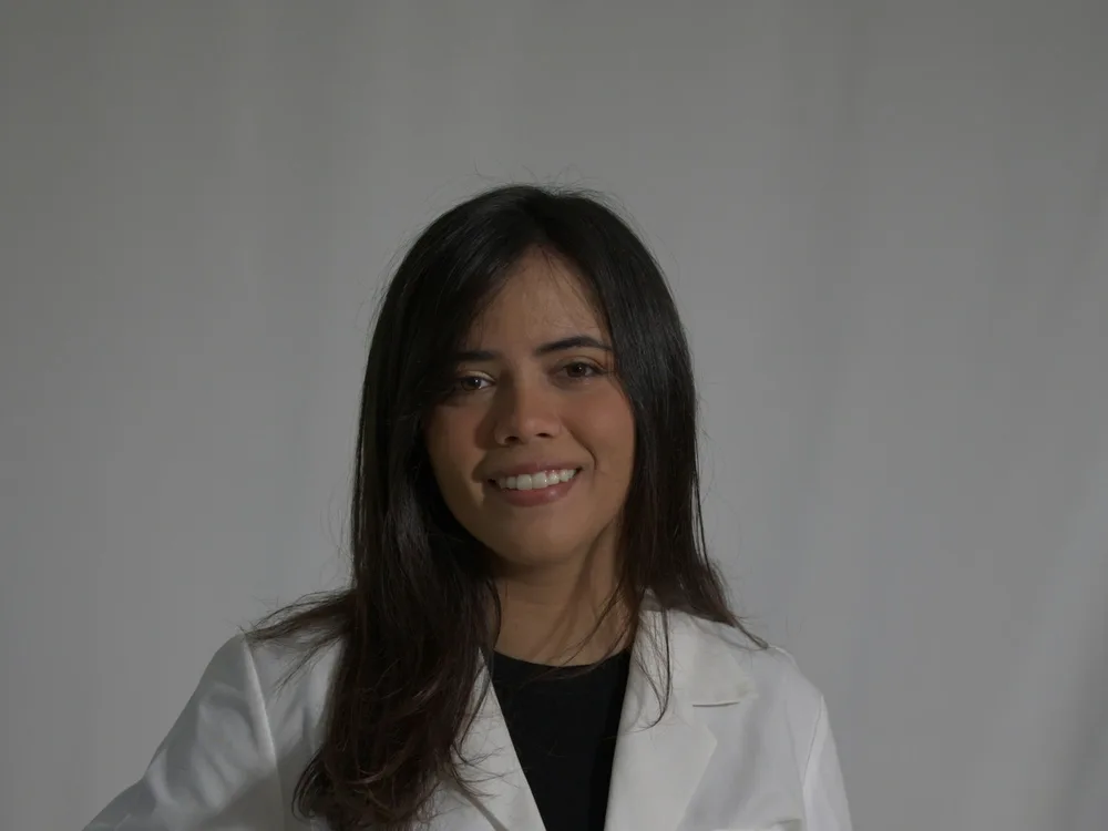 Dental and outpatient staff in clinical scrubs