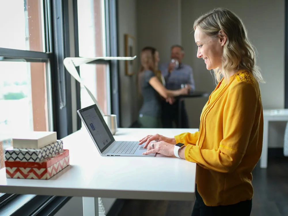 Remote worker in branded knitwear on a video call